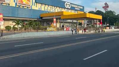 Gaisano Grand mall frontage seen across the highway