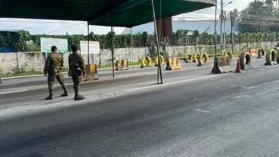 Green City Government of Davao tent set up at the roadside with personnel on duty