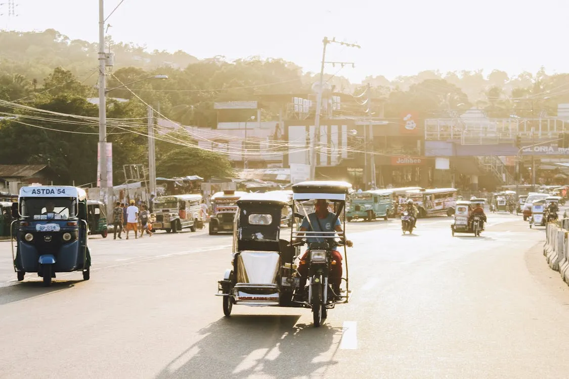 Tricycles on a road in the Philippines